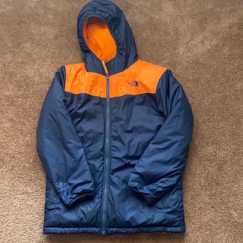 North Face winter coat. Boys 10-12. Blue/orange.